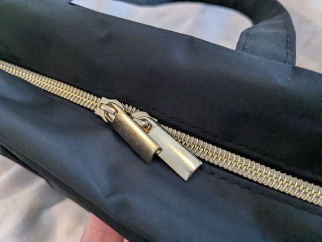 JILL by JILL STUARTリボンポーチ ファスナーアップ